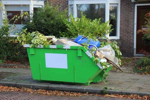 Team removing garden debris efficiently